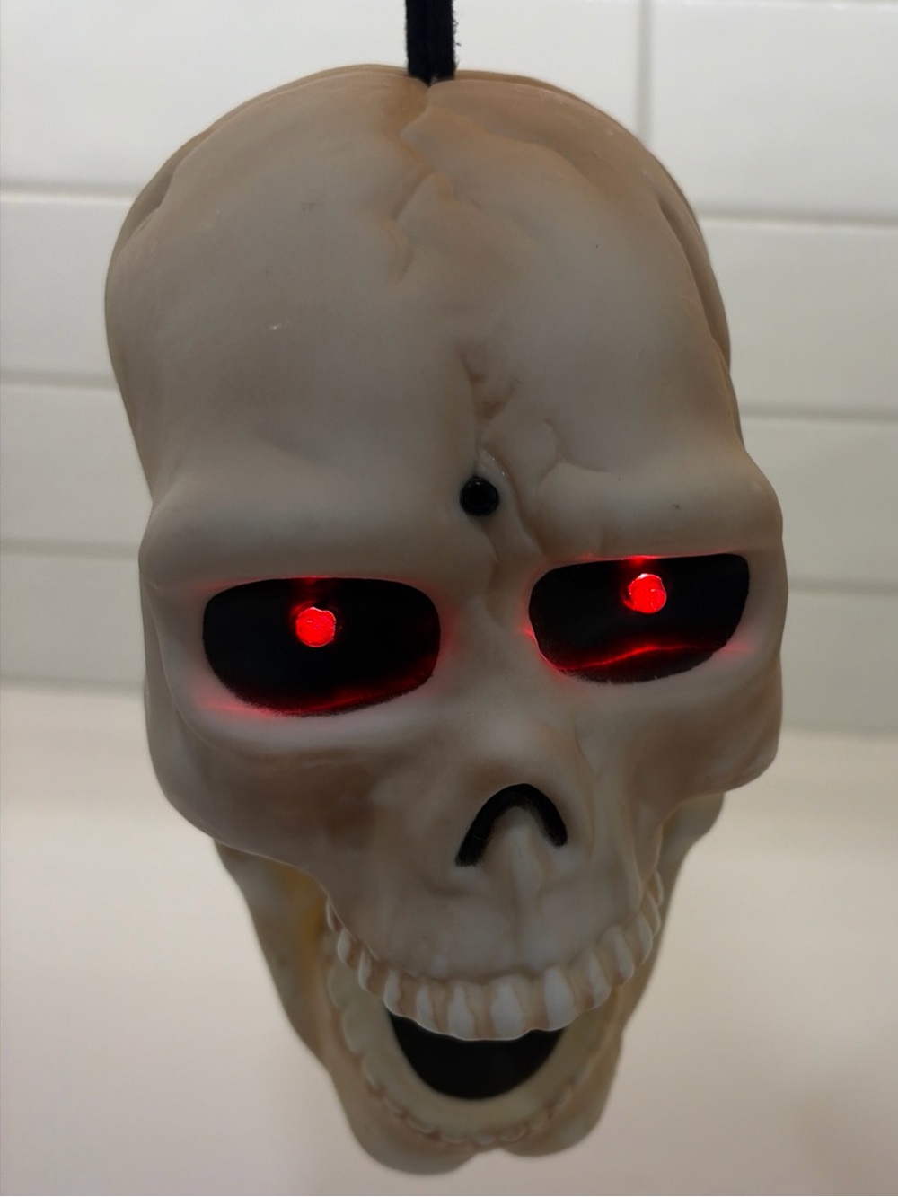 Halloween LED Skull Hanging Décor - White with Red Eyes